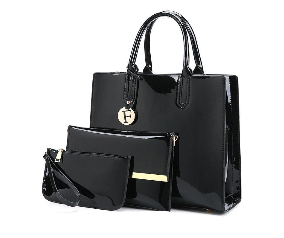 Black handbag set with a visible brand logo on a white background