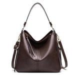 Brown leather handbag with gold accents