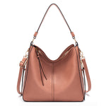 Brown leather handbag with gold accents