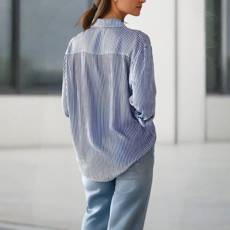 Chest pocket detail on Zarahut women’s striped blouse