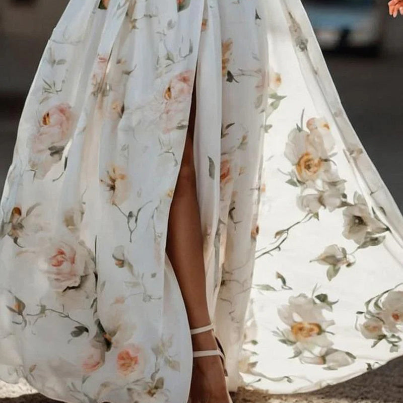 Close-up of flare sleeve, floral print, and high slit hem