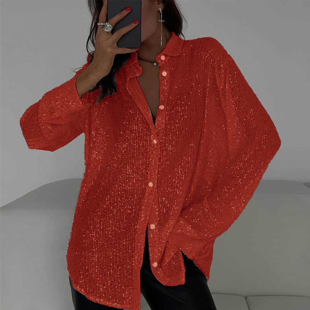 Person wearing a red textured shirt with a neutral background