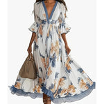 Women's Floral Print Maxi Dress front view with deep V-neck and flare sleeves